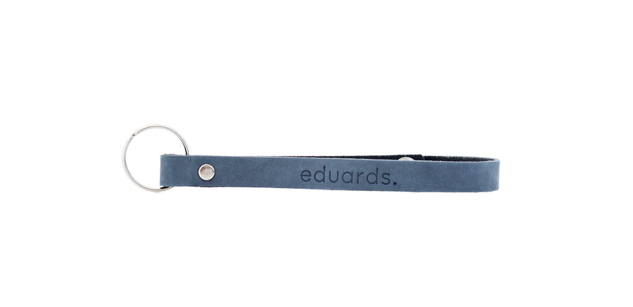 Deze dichtgeknoopte lederen sleutelriem van Eduards accessories houdt uw sleutels waar ze horen. Bevestig de sleutel aan je tas voor extra veiligheid.